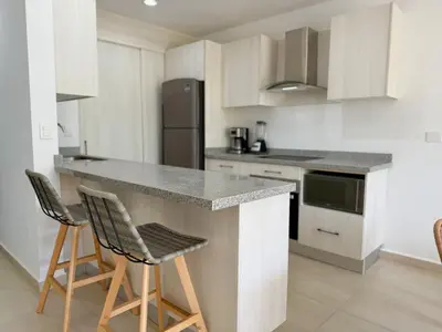 Una cocina o zona de cocina en Bonito Depa Cerca de la Playa