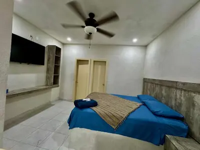 Cama o camas de una habitación en Mini Suits Limpias y Confortables