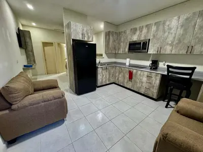 Una cocina o zona de cocina en Mini Suits Limpias y Confortables