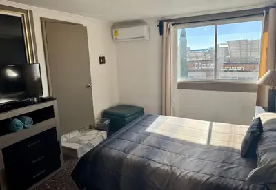 Cama o camas de una habitación en Suite 3 del Centro de Cuauhtémoc Chihuahua