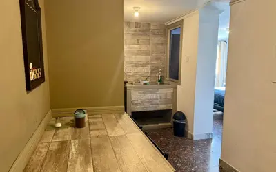 Una televisión o centro de entretenimiento en Suite 3 del Centro de Cuauhtémoc Chihuahua