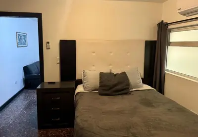 Cama o camas de una habitación en SUITE 5 Del Centro de Cuauhtémoc Chihuahua