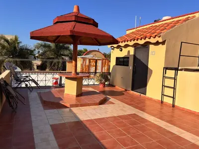 Un balcón o terraza de Depa en el Corazon de la Zona Dorada Y Playa