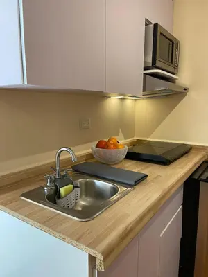 Una cocina o zona de cocina en Departamento Bonito cama Queen, con acceso privado