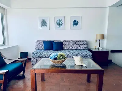 Zona de estar de Beachfront apartment with a pool Islas del Sol