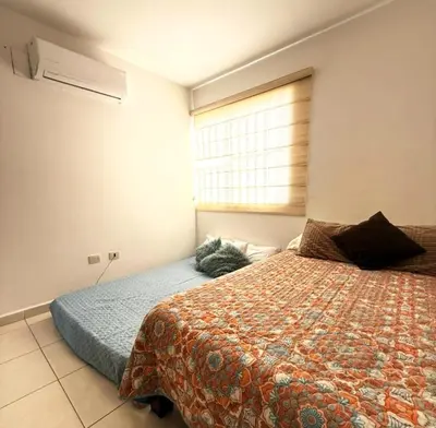Cama o camas de una habitación en Departamento Moderno Durazno - 2 Albercas - 3 Min Malecón y Playas