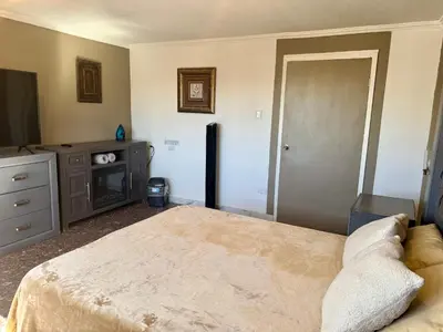 Cama o camas de una habitación en SUITE 4, Centro de Cuauhtemoc Chihuahua