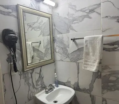 Un baño de SUITE 4, Centro de Cuauhtemoc Chihuahua