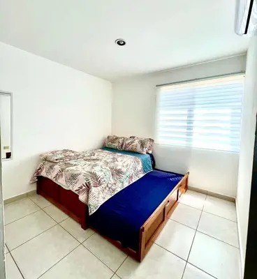 Cama o camas de una habitación en Departamento Moderno Negr0 Caramel 3 Min Malecón