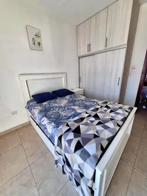 Cama o camas de una habitación en Malva Blanco Armonía 2 Min Malecón y Playas