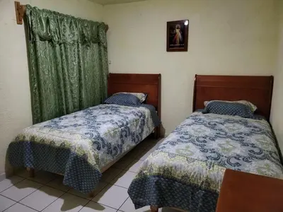 Cama o camas de una habitación en Casa entera cerca del Centro Histórico de Durango