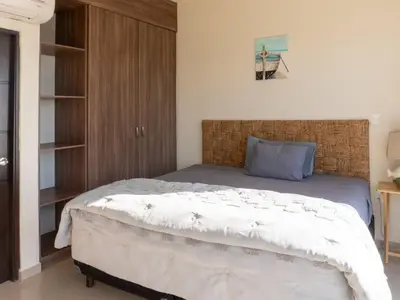 Plano de Stylish seaside apartment with stunning ocean view