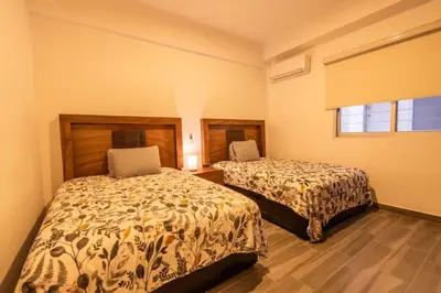 Plano de Spacious Apartment with Pool & BBQ Area
