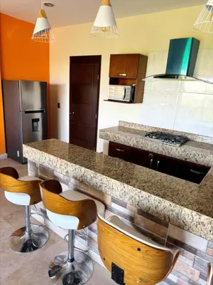 Una cocina o zona de cocina en Marina Azul - Sábalo Country 1 Min Playas
