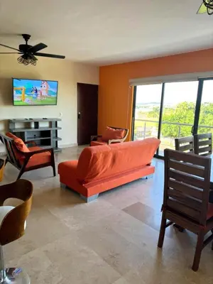 Una televisión o centro de entretenimiento en Marina Azul - Sábalo Country 1 Min Playas