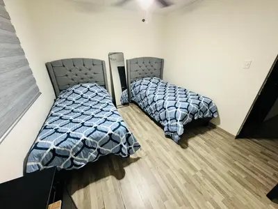 Cama o camas de una habitación en Cómoda casa en Saltillo