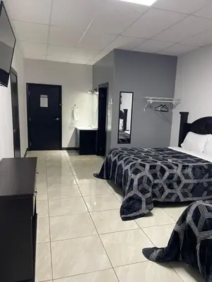 Cama o camas de una habitación en Hotel Plaza Berrendo
