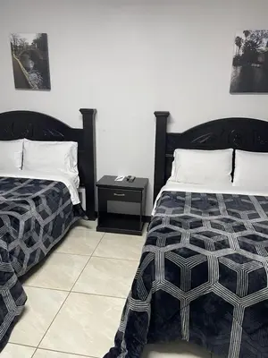 Cama o camas de una habitación en Hotel Plaza Berrendo