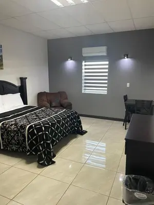 Cama o camas de una habitación en Hotel Plaza Berrendo