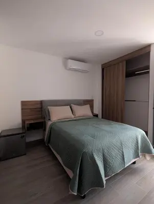 Cama o camas de una habitación en Habitación Luna, acceso a amenidades de lujo