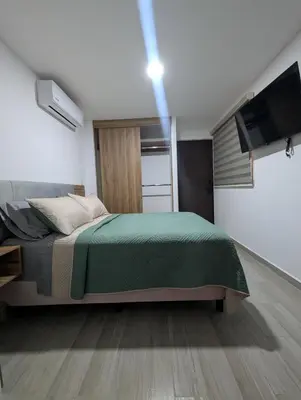 Cama o camas de una habitación en Habitación Luna, acceso a amenidades de lujo