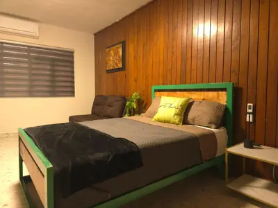 Cama o camas de una habitación en OLIMPIA Suites sleep local, Suite Jr