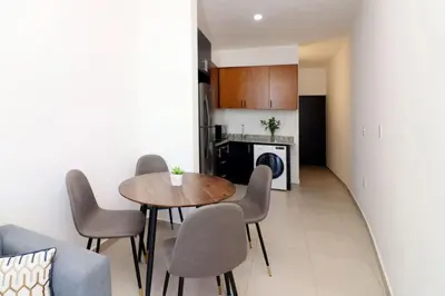 Una cocina o zona de cocina en Acogedor departamento con balcon y alberca en roof