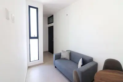 Zona de estar de Acogedor departamento con balcon y alberca en roof