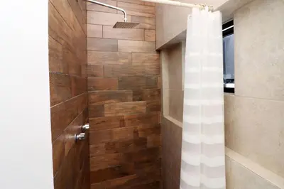 Un baño de Acogedor departamento con balcon y alberca en roof