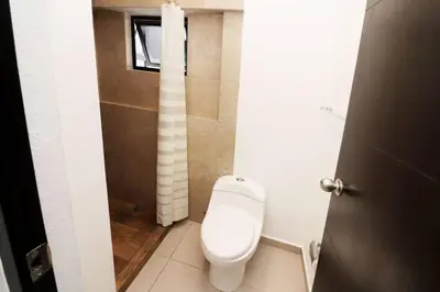 Un baño de Acogedor departamento con balcon y alberca en roof