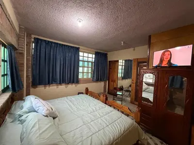 Cama o camas de una habitación en Departamento Nuevo Céntrico con vista hacia la catedral