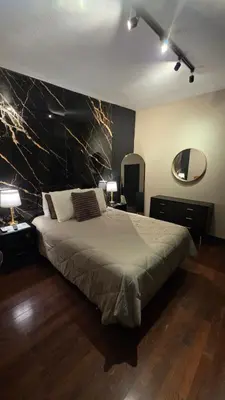 Cama o camas de una habitación en Luxury Suites Hong Kong a 100 mts del consulado
