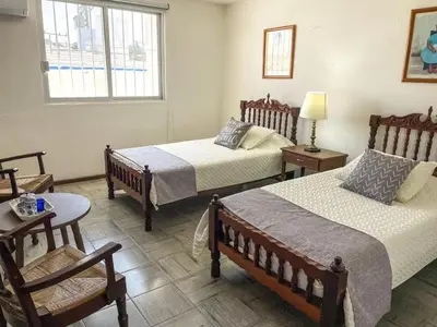 Cama o camas de una habitación en Villa Centenario
