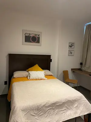Cama o camas de una habitación en ViveMazatlan