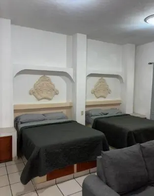 Plano de Suite 8 de dos camas con cocina y balcon Zona Dorada a pocos pasos de la playa No contamos con estacionamiento