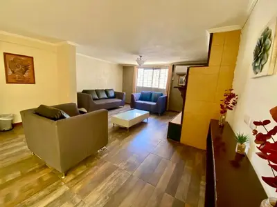 Zona de estar de Casa en zona residencial privada, con estacionamiento electrico en Cuauhtemco, Chihuahua