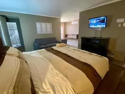 Cama o camas de una habitación en Casa en zona residencial privada, con estacionamiento electrico en Cuauhtemco, Chihuahua