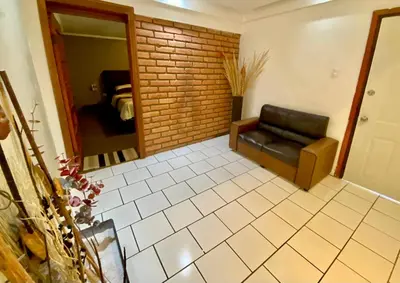 Una televisión o centro de entretenimiento en Casa en zona residencial privada, con estacionamiento electrico en Cuauhtemco, Chihuahua