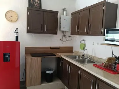 Una cocina o zona de cocina en Departamento cerca del aeropuerto