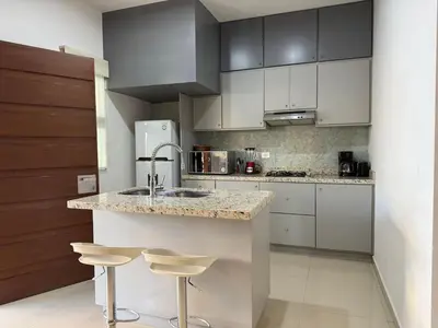 Una cocina o zona de cocina en Depa A Unos Pasos de la Playa y Zona Dorada