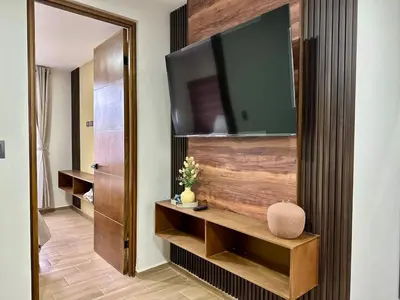 Una televisión o centro de entretenimiento en Nice central apartment