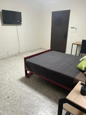 Una televisión o centro de entretenimiento en Renta de habitación equipada para ejecutivos