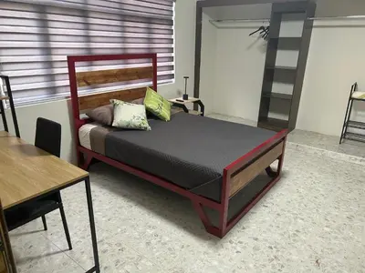 Cama o camas de una habitación en Renta de habitación equipada para ejecutivos