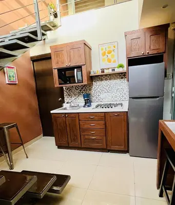 Una cocina o zona de cocina en Loft apartment in the north area