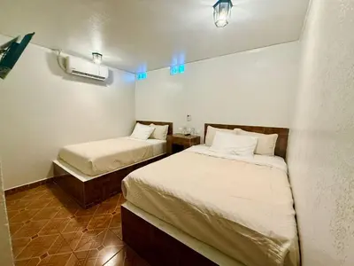 Cama o camas de una habitación en Comod Inn
