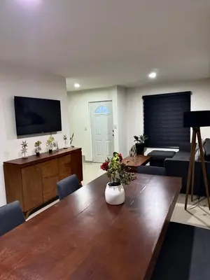 Una televisión o centro de entretenimiento en Casa en Privada!