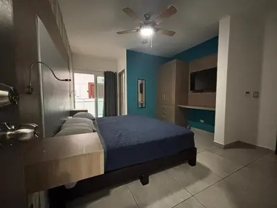 Cama o camas de una habitación en Pacífika Condominio