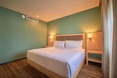 Cama o camas de una habitación en Wyndham Garden Saltillo