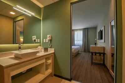 Cama o camas de una habitación en Wyndham Garden Saltillo