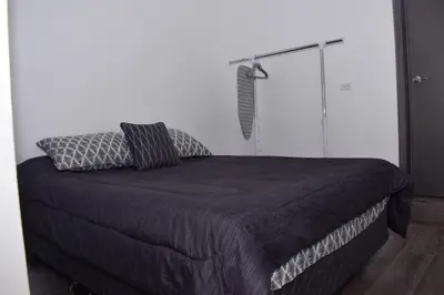 Cama o camas de una habitación en Departamento LUNA